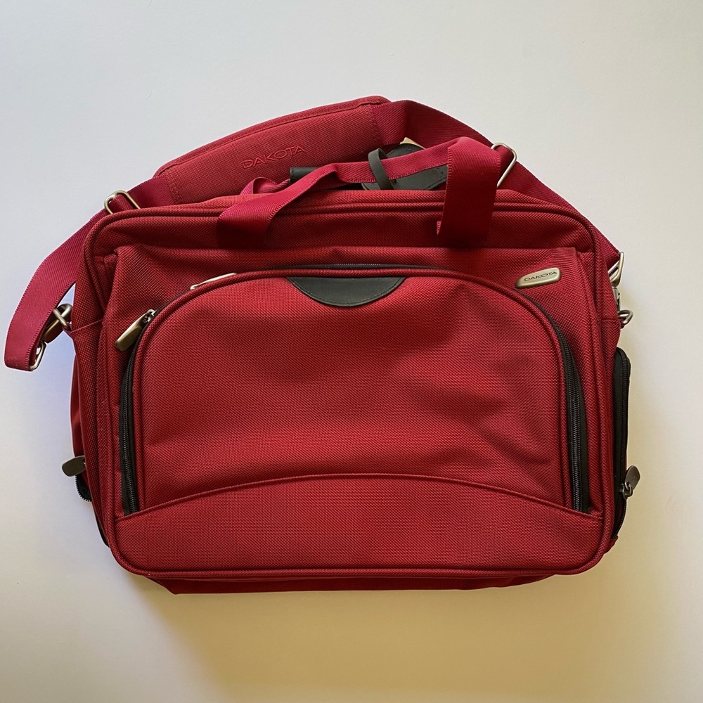 Dakota luggage by Tumi over the shoulder carry on new without tags